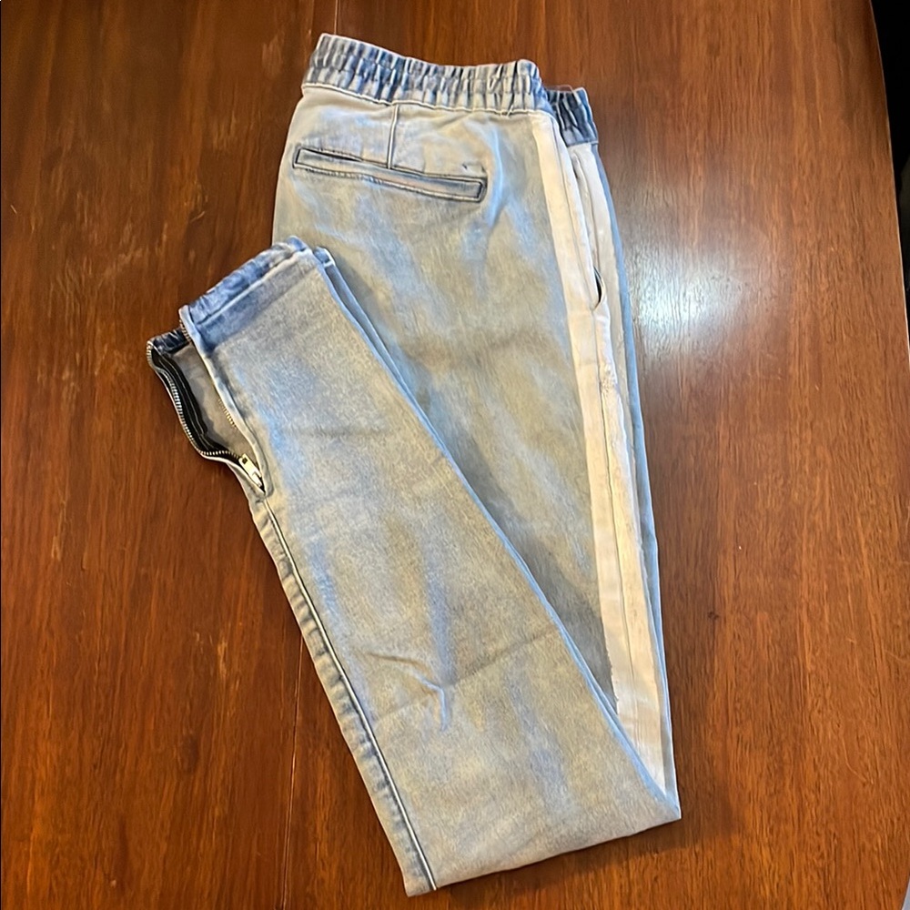 Men's Light Blue Jeans with Painted White Stripe and Zipper Detail